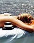 Терапията Hot Stone Massage Терапията Hot Stone Massage