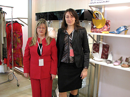 The designer Imelda Sánchez together with Silvia Kabaivanova, manager of  Fashion.bg in front of the stand of by Imelda during the Castilla y Leon Fashion week